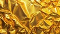 Crinkled golden foil with reflections shining in bright light, creating dynamic textures and patterns suitable for