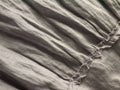 Crinkled gray natural linen fabric