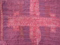 Crinkled surface of back side of red silk scarf Royalty Free Stock Photo