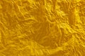 Crinkled yellow tissue paper background