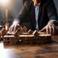 Crisis prevention Businessmans hands halt falling dominoes, showcasing risk management