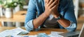 Crisis stricken caucasian man calculating debt and expenses, laptop and financial struggles Royalty Free Stock Photo