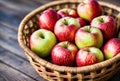 Crisp autumn apples nestle in a woven basket, their smooth skins and vibrant colors hinting at the juicy sweetness