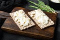 Crisp bread sandwich, on black dark stone table background Royalty Free Stock Photo