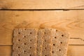 Crisp bread on the wooden background. Corn dodger. Crackers. Loaf of bread Royalty Free Stock Photo