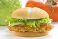 Crisp chicken burger tomato onion cheese lettuce