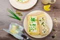 Crisp Crispbread with cheese spread with chives and Crisp Crispbread with curd cheese spread chives and seeds Royalty Free Stock Photo