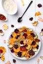 Crisp crunchy organic vegetable chips with oven-baked pumpkin, beetroot, tomato, carrot chips snacks with sauce