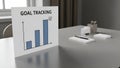 Goal Tracking Bar Chart on Modern Office Desk Royalty Free Stock Photo