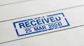 Official RECEIVED Stamp on White Paper with Date 25 MAR 2024 for Document Tracking and Business Administration Royalty Free Stock Photo