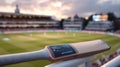 Crisp medium shot showcasing a cuttingedge cricket bat sensor sending realtime performance metrics to a cloud interface Royalty Free Stock Photo