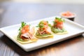 crisp shot of a taco trio with salsa verde drizzle Royalty Free Stock Photo