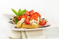 Crisp waffle with strawberries and cream Royalty Free Stock Photo