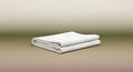 Crisp white bedding folded neatly for display Royalty Free Stock Photo