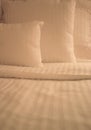 Crisp White Sheets on Bed Royalty Free Stock Photo