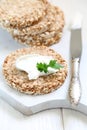 Crispbread with curd cheese and tomato on a white background Royalty Free Stock Photo