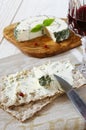 Crispbread and French cheese with and glass of red wine Royalty Free Stock Photo