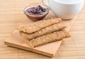 Crispbread and jam. On a wooden stand. Royalty Free Stock Photo