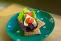 Crispbread with salad, cheese and tomatoes