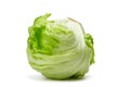 Crisphead lettuce, one whole head of iceberg lettuce, leafy green vegetable isolated on white background Royalty Free Stock Photo