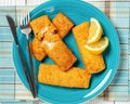 crispy baked battered pollock fillet on a plate