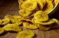 Crispy banana chips in a bowl. Common Indian savory item