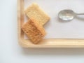 Crispy Bread Butter Sugar on wooden tray on white background. Biscuit homemade. Dessert, Snack Royalty Free Stock Photo