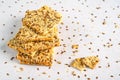 Crispy bread slice with cereals. Healthy cookies with sunflower seeds, flax seeds and sesame seeds.