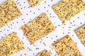 Crispy bread slice with cereals. Healthy cookies with sunflower seeds, flax seeds and sesame seeds.