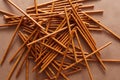 Crispy bread straw on brown paper background Royalty Free Stock Photo