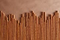 Crispy bread straw on brown paper background