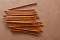 Crispy bread straw on brown paper background Royalty Free Stock Photo