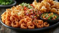 Crispy Calamari and Chips Platter with Fresh Salsa and Dips Royalty Free Stock Photo