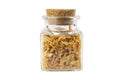 Crispy carmelized fried onion flakes in a glass jar isolated on white background. Spices and food ingredients