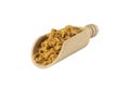 Crispy carmelized fried onion flakes in wooden scoop isolated on white background. Spices and food ingredients