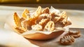 Crispy chiacchiere sprinkled with powdered sugar in a sunlit bowl, a festive Italian carnival treat. Chiacchiere cookies, dusted