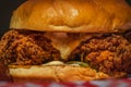 Crispy Chicken Burger. Fatty junk food concept. Southern Country Fried Chicken Sandwich with Mayo and Jalapenos Royalty Free Stock Photo