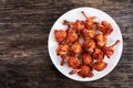 Crispy chicken winglets with exposed bones Royalty Free Stock Photo