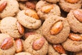 Crispy cookies with almond as a background close up. Selective focus