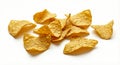 Crispy corn tortilla chips scattered on a clean white surface, showcasing their golden texture and triangular shape Royalty Free Stock Photo