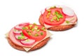 Crispy Cracker Sandwiches with Tomato, Sausage, Cheese, Green Onions and Radish - Isolated Royalty Free Stock Photo