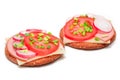 Crispy Cracker Sandwiches with Tomato, Sausage, Cheese, Green Onions and Radish - Royalty Free Stock Photo