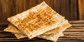 Crispy crackers stacked on a wooden surface, perfect for snacking Royalty Free Stock Photo