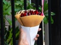 Crispy crepe filled with luscious strawberry whipped cream is a delightful treat that combines the satisfying crunch of the crepe Royalty Free Stock Photo