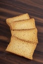 Crispy and crunchy milk toast or rusk on wood texture .jpg Royalty Free Stock Photo