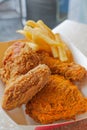 Crispy deep fried chicken and french fries