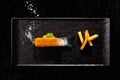 Crispy deep fried fish finger with raw tail and salt as bubbles Royalty Free Stock Photo