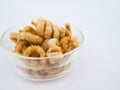 Crispy deep fried pork skin or pork rind in bowl