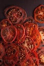 Crispy dehydrated tomato slices Royalty Free Stock Photo