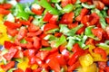 Crispy delicious vegetarian green, yellow and red bell peppers sliced and cut, close up view Royalty Free Stock Photo